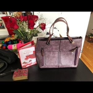 Purple bag new with extra strap
